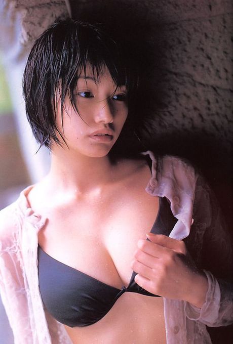 Short haired foxy asian babe looks very hot in her white lingerie