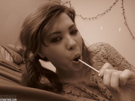 Amateur Asian Sydney Mai shows her tiny tits and toys her pussy in a solo