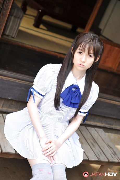 Stunning japanese dark-haired cutie Ai Uehara in skirt showing her beauty